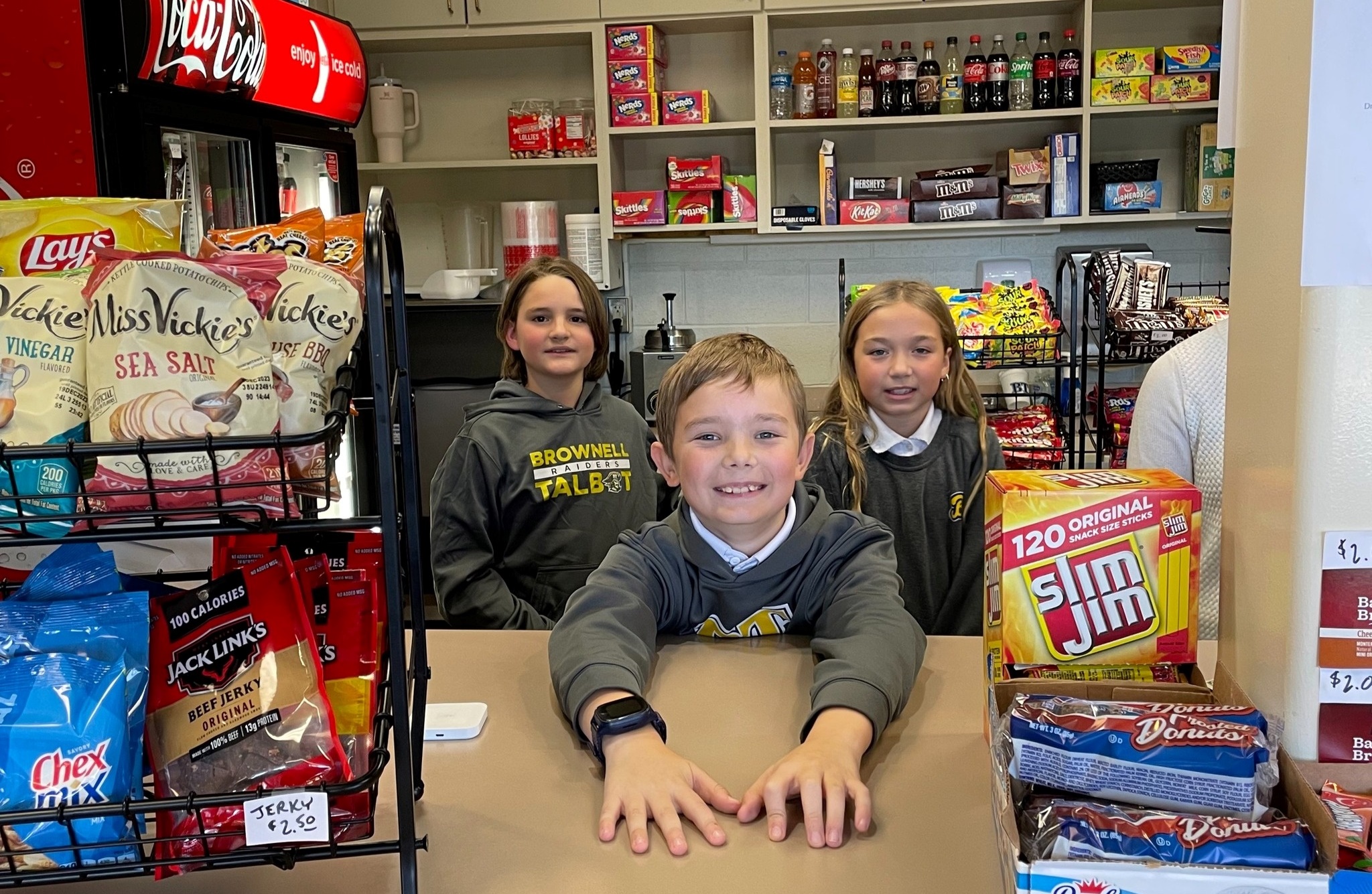 Fourth Grade Volunteers Work Concessions Stand